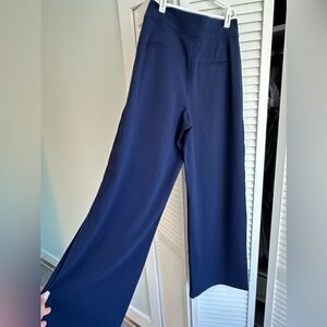 High rise dress pants. Stitch detail on sides.